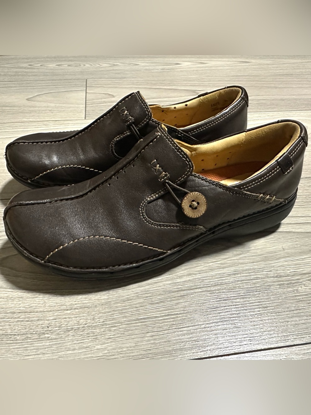 Clarks Women's “Un Loop” Dark Brown Leather Slip-On Loafers with Button Accent